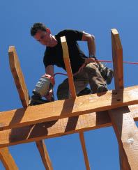 Toe-nails (or screws) fasten the rafters to the girders.