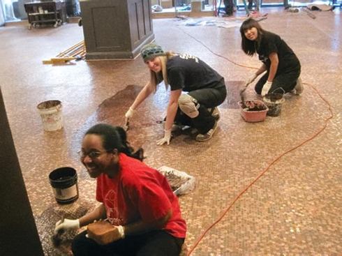 Grout the pennies with clear Rock-Kote epoxy. Wear kneepads.