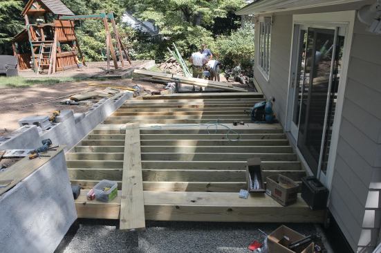 With the ledgers installed, framing was typical. The blocking will support seam boards in the decking.
