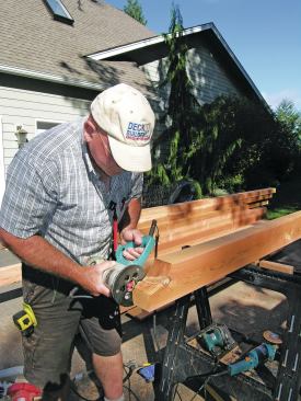 After smoothing the profile with a sander, the author eases the edges with a round-over bit mounted in a router.  