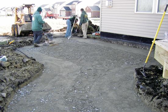 Crusher run stone laid in 3- or 4-inch lifts forms the base layer.