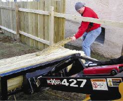 Figure 7. If you do any lawn repair, a leveler/carry-all attachment enables you to leave the rake at home (top). And it’s hard to beat for moving material from the driveway to the backyard (bottom).