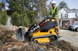 Figure 8. While you wouldn’t want to dig a house foundation with one, subcompact loaders handle the equivalent of eight to 10 joint-compound buckets of dirt at a scoop and make quick work of the light excavation common to deck building.