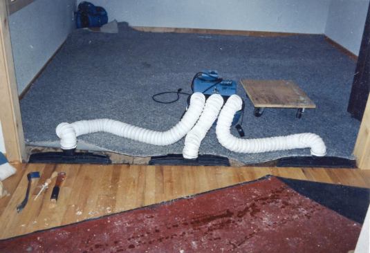 The equipment needed for structural drying — including air movers (top and bottom, left) and water testing meters (below) — typically represents a contractor’s biggest capital expenditure when entering the restoration field. 