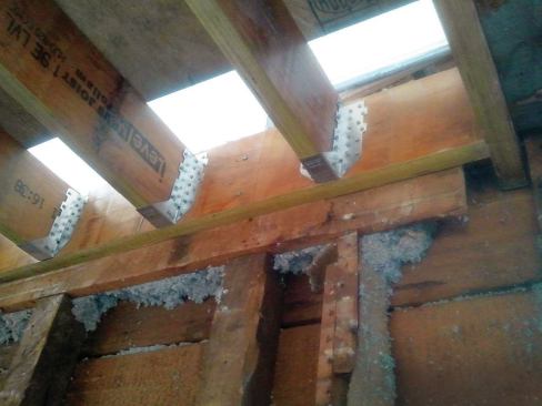 Metal connectors and beams were added where the old structure needed strengthening.