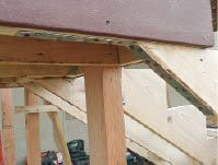 Figure 3. When joists are parallel to the jacks, install blocking between the joists to receive the strapping. The strapping is nailed to the bottom of the outer joist with 16d commons; the combined strength of the inner connections compensates for this somewhat sketchy one