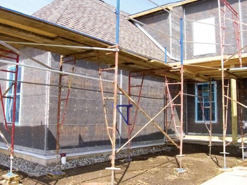 Once the house is completely wired, it’s ready for plaster.