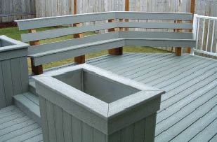 Figure 3. A bench provides seating for the grillmeister’s audience. Using two steps where one would have sufficed makes the level change more visible and therefore safer.