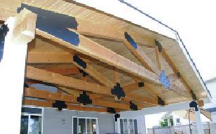 Figure 5. The author designed decorative metal plates to dress up the timber connections in the roof.