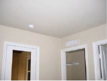 The wet spots were not visible on the surface of the drywall ceiling.