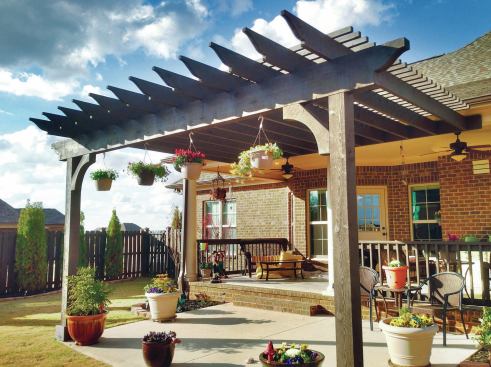 This photo was taken with a High Dynamic Range (HDR) iPhone app, which combines several exposures to create a photo that is not possible with a single shutter click. Even though this photo was shot in an extremely high-contrast situation, the brick, the dark pergola, and the blue sky are all balanced reasonably well. You can also use HDR photography with a DSLR camera and a tripod to produce superior images.