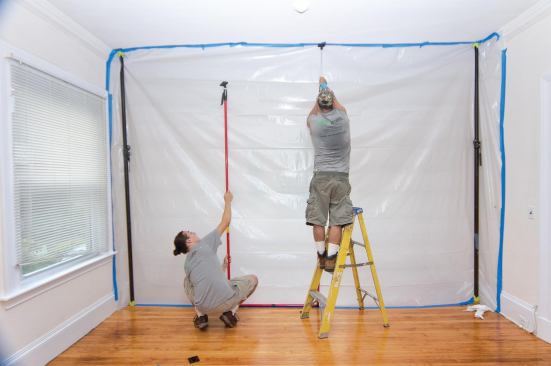 Setting up the door with old photographic background stands