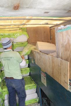 The hopper that feeds material to the operator can be filled to the ceiling, providing enough material to last from 15 minutes to an hour, depending on the application.