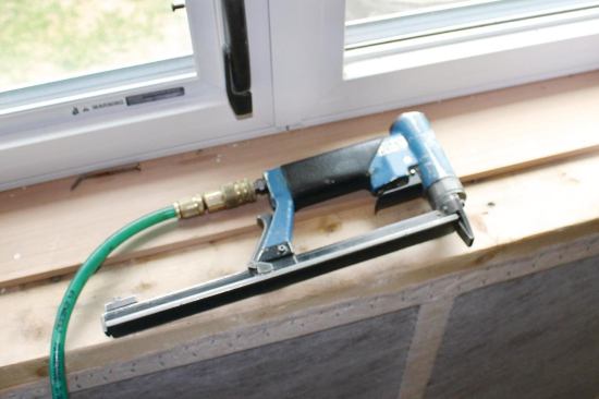 Netting is fastened with a pneumatic upholstery stapler.