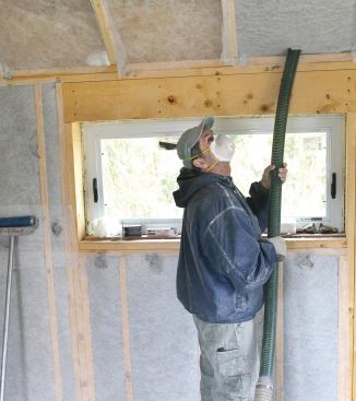When filling rafter cavities, the usual insertion point is just above the top plate. The natural curvature of the longer hose required tends to direct the flow of insulation to one side of the cavity, so filling it uniformly requires a second pass with the curve facing the other way.