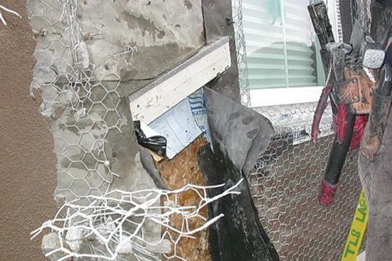 Shown here is a shutter block that was installed on top of a piece of light-blue self-adhered flashing. Unfortunately, the building paper was then installed on top of the flashing beneath the block, which allowed water to run behind the paper and soak the framing.