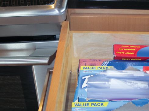 The second was a conflict between one of the corner drawers and the range, which prevents the drawer from opening fully. There was no good solution, but because the restriction is only a couple of inches, the owners find they can live with it.