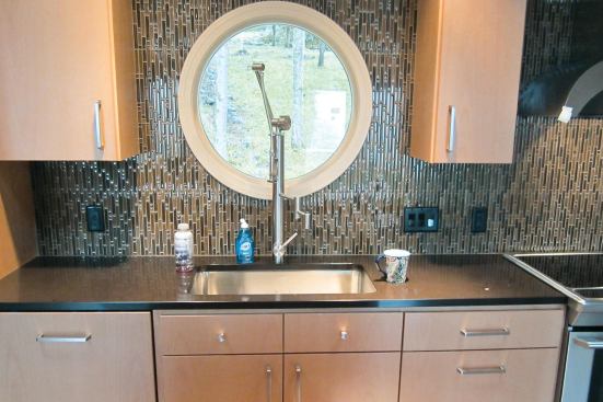 Due to slight discrepancies in various dimensions, we had to move the faucet ever so slightly off-center in relation to the sink, bringing it closer to the drawer-front gap. It’s good the customers had chosen a single-bowl sink, or the discrepancy would have been much more visible.