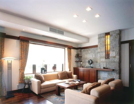 Although indoor units are most often mounted high on a wall, some models are designed to be concealed in a soffit as shown above.