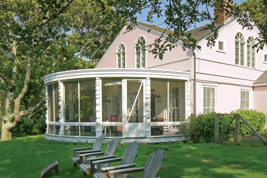 The restored 1930s porch: Like a lot of coastal porches, this one had had rot problems, and the deck framing was sagging. The porch had been repaired many times, but the underlying problems that caused the rot had never been corrected.