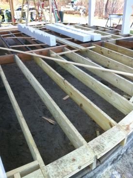 Here, the deck floor frame joists and blocking have been trimmed in a smooth radius.