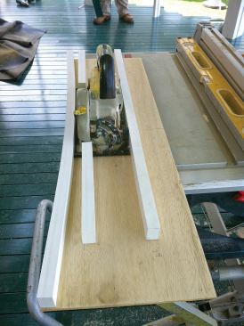 To cut the new decking to length after installation, the author made a plywood extension fitted with a curved fence for his Porter-Cable 4-1/2-inch trim saw.