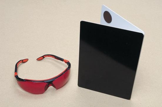 Target Accessories. Laser-enhancement glasses make it much easier to see the laser dot on distant targets or in bright light. Target plates (above right) maximize the measuring range and brighten the dot. The two items shown above are Hilti accessories. In a pinch, a Post-it note (below) makes a quick and easy target at edges and outside corners.