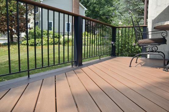 Wide newels give this low-profile metal railing 

a more substantial look.