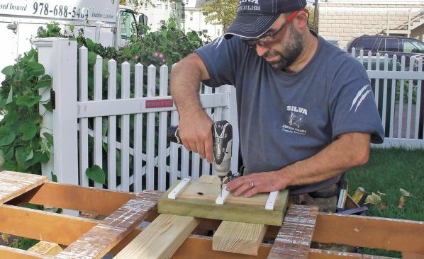 PVC strips raised the blocks supporting the new newels off the ground to enhance drying.