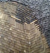 The roofers beveled the edges of opposing shingles that met in the valley bottoms. As each course advanced on a rising curved line out of the valley, the shingle butts were angled to the left or the right as required; the angle decreased from the valleys to the peaks of the lobes. Exposures decreased from the bottom of the structure to the top.