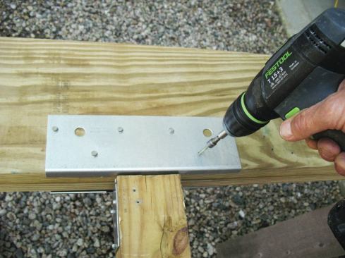 Using structural screws instead of nails will increase the uplift and lateral-load-bearing capacity of most metal connectors.