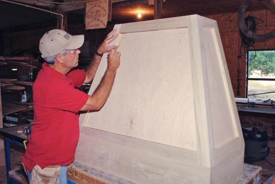 The author used a scrap of poplar to trace where the molding met in the corners and to determine the intersecting angles.