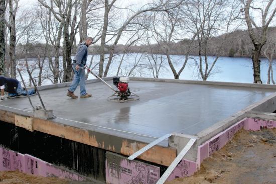 A power trowel adds the final finish.