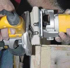 The finished edge profile with the router and trimmer held in place.