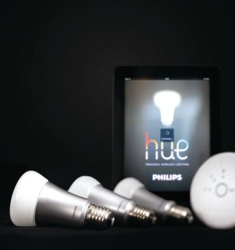 The Hue from Philips (meethue.com) is a home lighting system that includes proprietary LED lamps capable of displaying 16 million color variations. The lamps are controlled through a base unit that connects to an existing wireless network and can be operated via any iOS or Android device, or through a Web-based application. The system enables users to schedule lighting tied to behavior patterns, and includes a feature called “geofencing,” which can adjust lighting based on detection of a mobile device carried by a homeowner approaching or leaving the home.