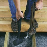 Figure 6. The Tebo hidden-fastener tool drives a three-prong stainless steel staple. One prong goes into the joist and one into the existing deck board’s edge. The third prong faces outward, and the next row of boards is driven onto the prongs.