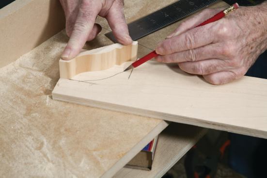It’s simple to make a crown holder from a scrap of plywood.