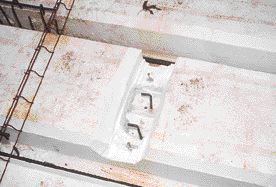 To provide for a chain fall or hoist, the author installed a pair of foundation anchor bolts through one of the floor forms.