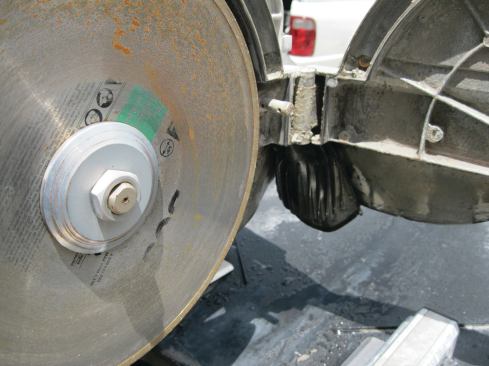 When the pump is running, water is sprayed onto the blade through a pair of orifices at the rear of the housing.