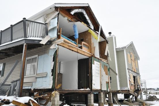 Along the Connecticut shore, the storm surge on the Long Island Sound destroyed shorefront houses.  