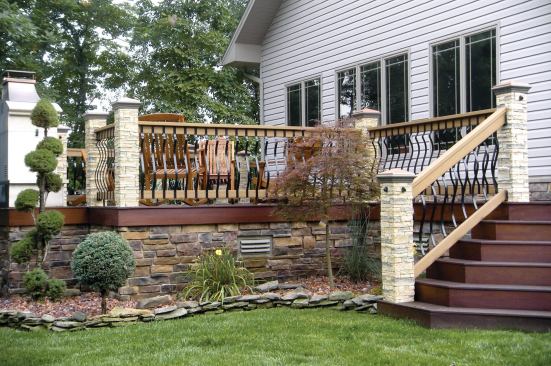 Note the vent in the stone-clad skirting. Good air circulation under the deck was necessary for the ipe decking. 