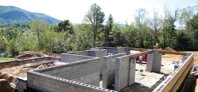 When we arrived on site and checked his work with our transit, the foundation was still out of level by as much as 1 1/2 inches.