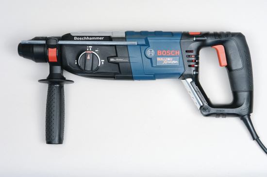 The Bosch Bulldog Xtreme Max SDS-Plus Rotary Hammer is billed as a step up from Bosch's widely used Bulldog Xtreme model. Like it's predecessor, the 8-amp Max offers rotary hammer, hammer-only, and rotary-only options; and a built-in clutch, along with many other features that make drilling and chipping concrete faster and more efficient than with ordinary hammer drills. What sets the Max apart from its older brother is a built-in "shock absorber," which makes it more comfortable to use and less likely to induce repetitive-stress injuries.