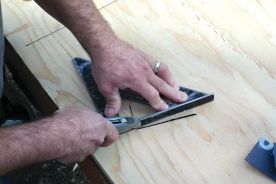 Cut "bowtie" strips, which are applied to seal corner seams, from flashing material scraps.