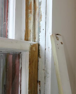 Paint is also removed from the inside of the window frame and the edge of the stop; raw wood surfaces will be waxed.