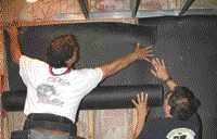 The 54-inch-wide rolls are installed over the framing and lapped 6 inches between studs or joists.