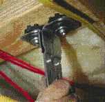 Another method for acoustically isolating walls and ceilings uses isolation clips with rubber mounting pads.