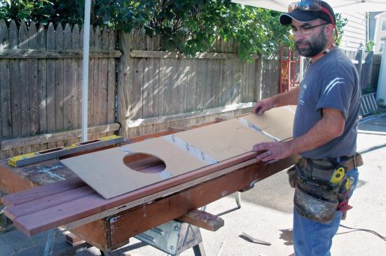 With the tread boards temporarily screwed to a backer board, the template was set in place.