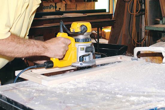 I then cut a 3/8-inch rabbet around the inside of each frame with a router to accommodate the plywood panels, which I would make from readily available 3/4-inch birch plywood.