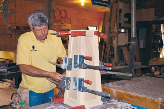 The clamps provide the pressure, while the headless pins keep the panels aligned.